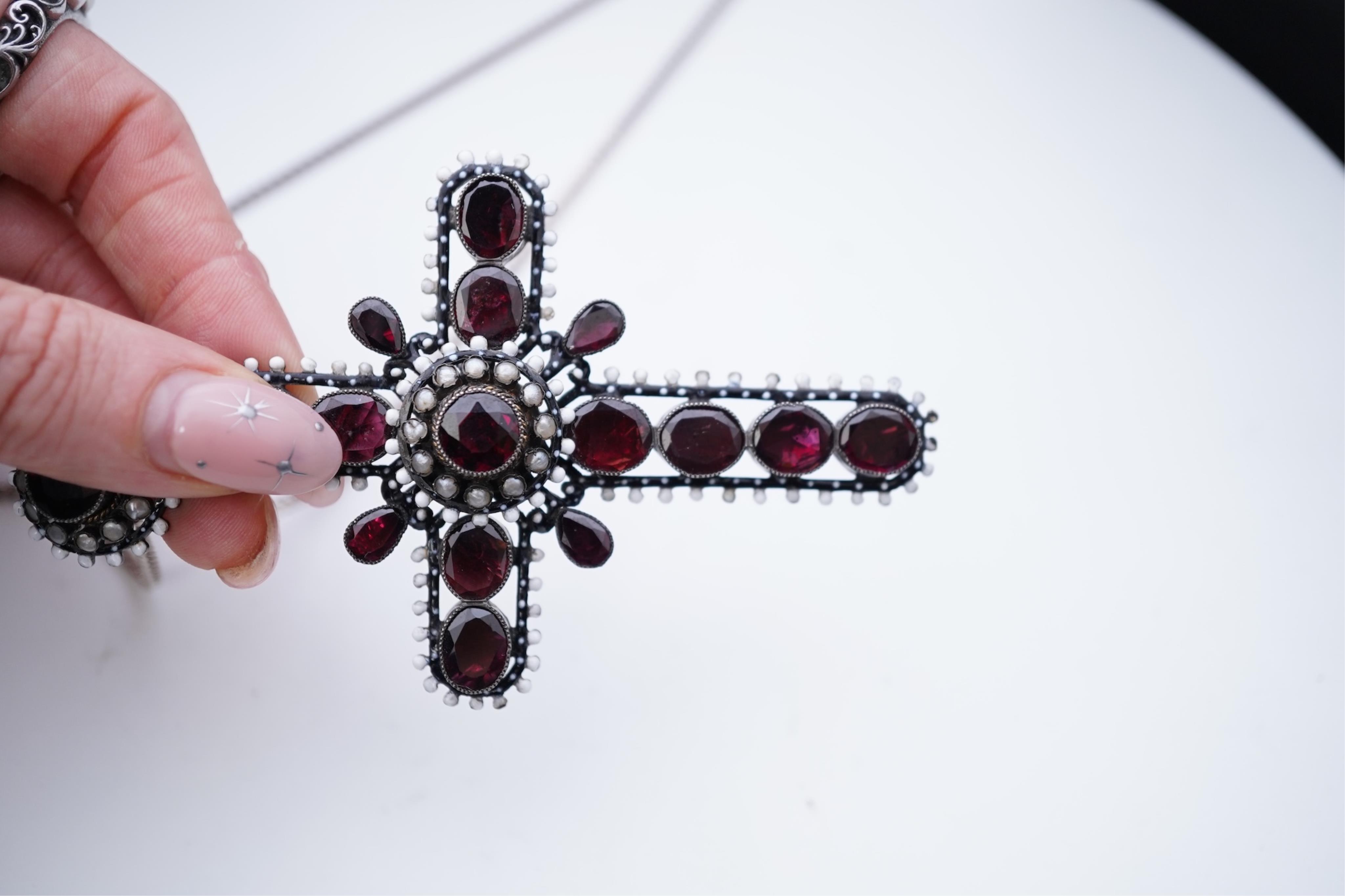A Renaissance Revival enamel and garnet pendant, late 19th century